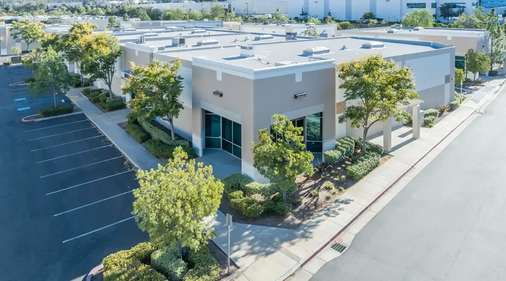 An aerial view of a warehouse building the site of commercial restoration services