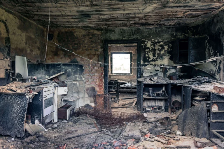 burnt down home showing fire vs smoke damage